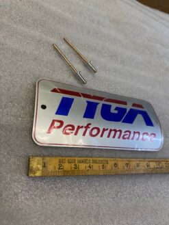 Alternative view of TYGA silencer badge, large